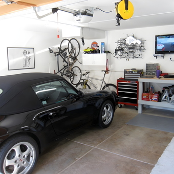 Organized garage with tool chest, workbench, and wall storage - darell from sonoma, CA