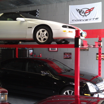 Garage Car Lift with Corvette Decor and Classic Cars - Dave