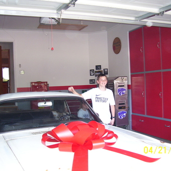 Red Garage Cabinets and Classic Car with Bow - Fink from Derby, KS