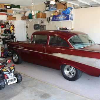 Organized garage with classic car and storage shelves - Major B from Albany, GA