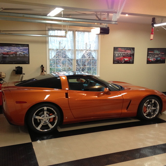 Organized garage with Corvette, toolbox, and wall art - Frank from Lehigh Valley, PA