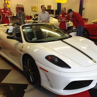 Luxury Ferrari Garage With Checkered Flooring - 16M from Overland Park, KS