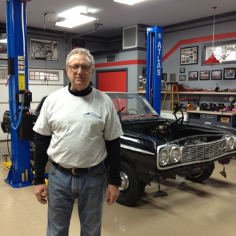 Classic car on Atlas lift in organized garage - Mike from Bowling Green, KY