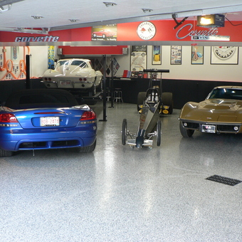 Custom garage with Corvettes, race car, car lift, and decor - Wayne from Goodyear, AZ