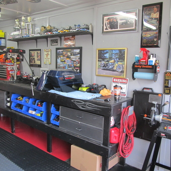Organized garage workbench with tool storage and decor - Wayne from Gainesville, TX