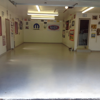 Clean garage with epoxy floor and wall signs - Fluff from Chicago, IL
