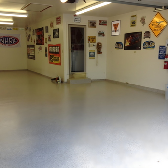 Clean garage with wall signs and epoxy floor - Fluff from Chicago, IL