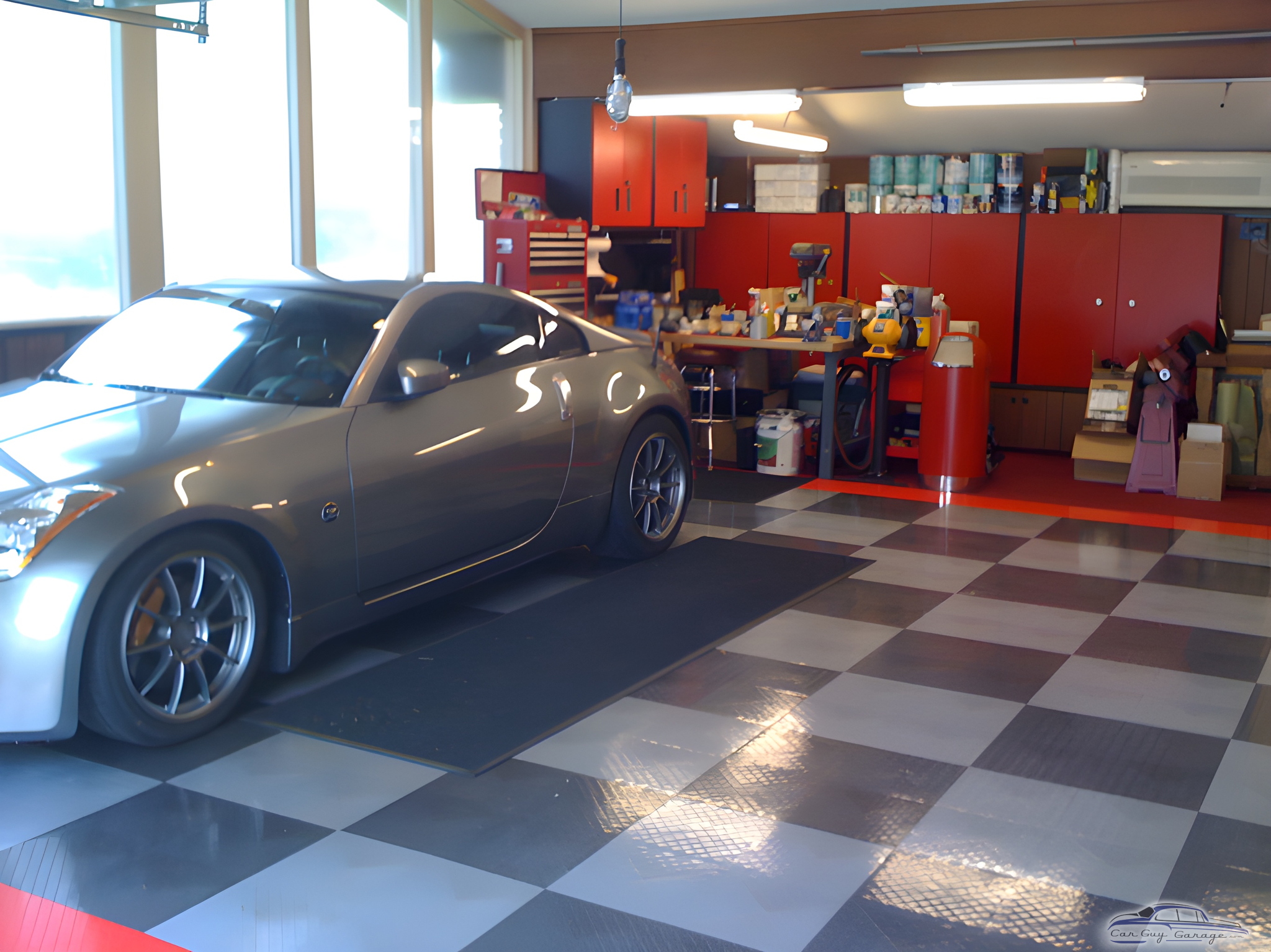 Organized garage with checkered floor and red cabinets - Marty from South Bend, IN