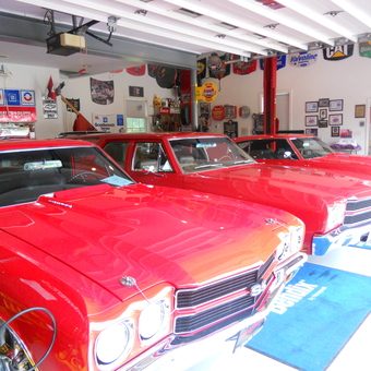 Classic Red Muscle Cars in Decorated Garage - Jeffrey from Joppa, MD