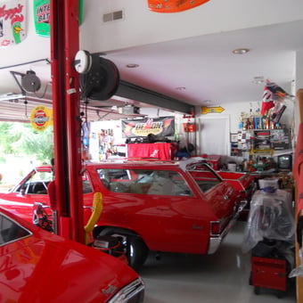 Classic Red Cars and Collectibles in Organized Garage - Jeffrey from Joppa, MD