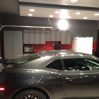Modern garage with gray cabinets and sports car - Foosdaddy from Tulsa, OK