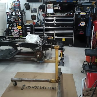 Organized garage with tool chests, engine stand, and car parts - Tammi from Neptune City, NJ