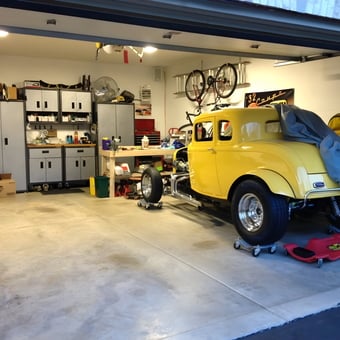 Organized Garage with Yellow Classic Car and Storage Cabinets - Graffiti Freak from Oswego, IL