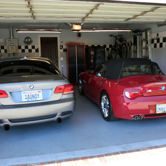 Organized garage with BMWs, cabinets, and bike rack - Lee from Northridge, CA
