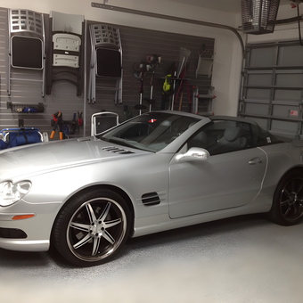 Organized garage with slatwall storage and silver convertible - Joel from Boynton Beach, FL