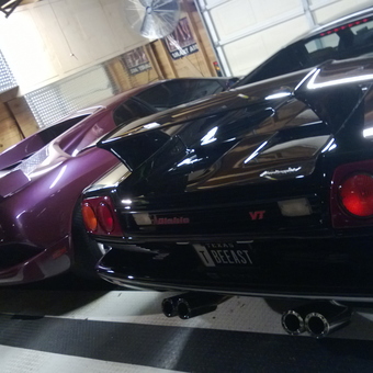 Luxury Sports Cars in Custom Garage with Storage - Mario's Diablos from Houston, TX