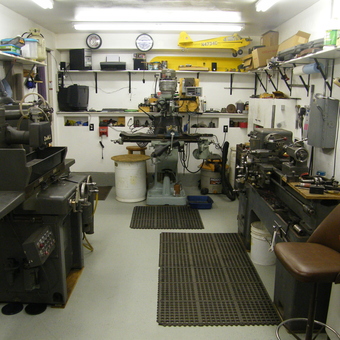 Organized garage workshop with industrial machines and tools - Chuck from Red Cloud, NE