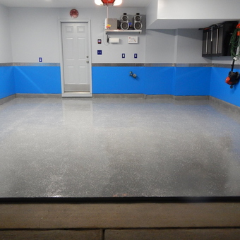 Clean epoxy garage floor with blue walls and cabinets - KLE880 from Dundalk, MD