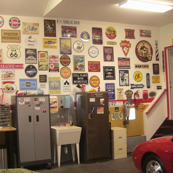 Garage Wall Decor with Metal Signs and Cabinets - Cisco's Garage from Aroda, VA