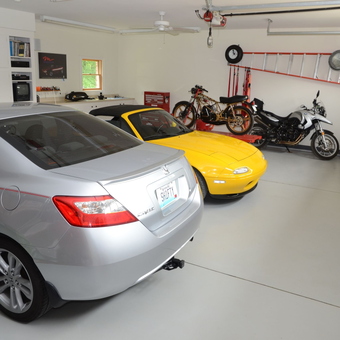 Organized garage with cars, motorcycles, cabinets, and tools - Tom from Fisherville, KY