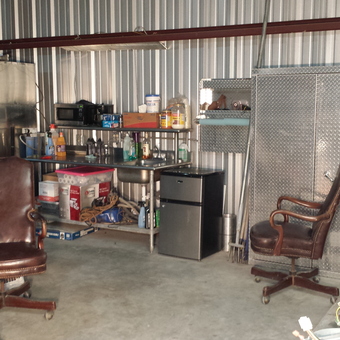 Garage with Metal Cabinets and Rolling Chairs - June Bug from Vinton, LA