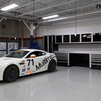 Race Car Garage with Black Metal Cabinets - Car Guy Garage Custom Cabinets