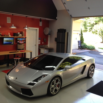 Modern Garage With Workbench, Storage, and Sports Car - Rich White