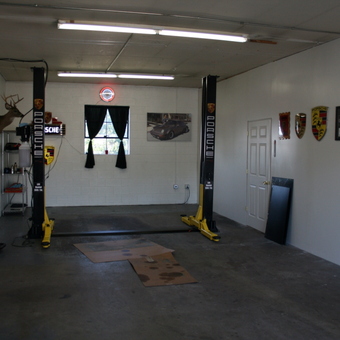 Porsche-Themed Garage with Car Lift and Wall Decor - Brett from Lititz, PA