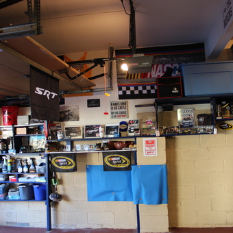 Organized Racing Garage with SRT Decor and Storage - RockSRT from Verona, NJ