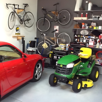 Organized garage with wall bike racks, shelves, and tool chest - Bingjeep from North Canton, OH