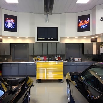 Modern garage with neon signs, cabinets, and tool chest - Joe from Colden, NY