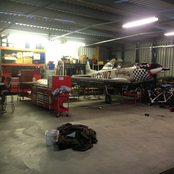 Organized garage with tool chests, shelves, and airplane - Jeromie from Richland, WA