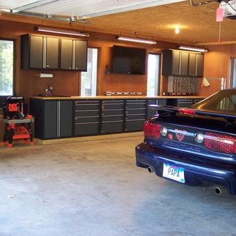 Modern garage with storage cabinets and Trans Am - Papa Mike from Chester, SD