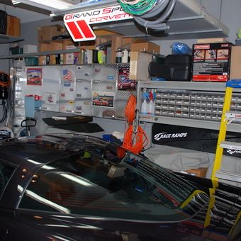 Organized garage with storage shelves and Corvette - Herb from Coral Springs, FL