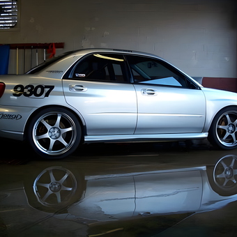 Sporty Silver Sedan with Racing Decals in Garage - Squidz from Fort Worth, TX