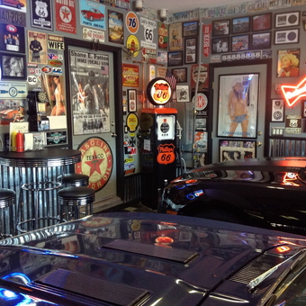 Retro Garage with Neon Signs and Classic Decor - Dixon