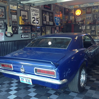 Classic Car Garage with Neon Signs and Wall Decor - Dixon