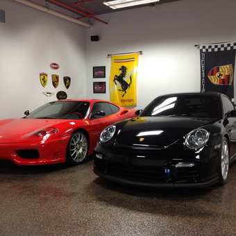 Luxury Garage With Ferrari and Porsche Decor - The Vault from Tampa, FL