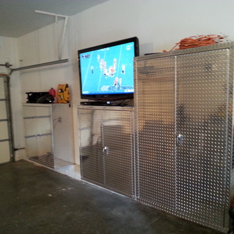 Diamond Plate Garage Cabinets with TV Setup - Paul from Eldridge, IA