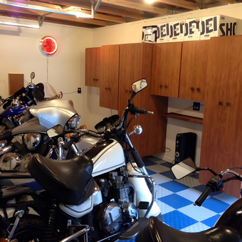 Motorcycle Garage with Storage Cabinets and Blue Tile Floor - Bear Pilot from Bellingham, WA
