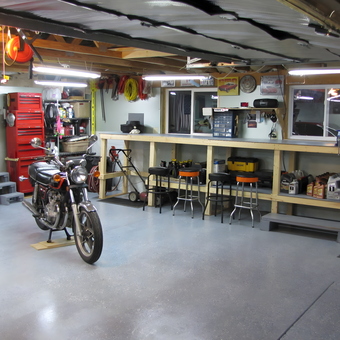 Organized garage with workbench, tool chest, and motorcycle - Nathan from Linden, MI