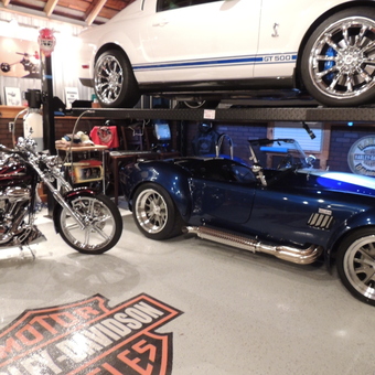 Classic Car Lift, Motorcycle, and Decor in Garage - Trouble from Detroit, MI