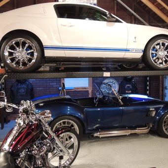 Classic Car Lift With Mustang, Cobra, and Motorcycle - Trouble from Detroit, MI