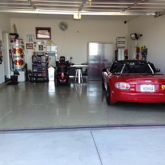 Organized garage with red convertible and storage solutions - Kurt from La Mesa, CA