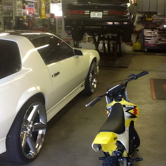 Garage with Classic Cars, Motorcycle, and Tools - Tire boy from Florissant, MO