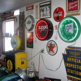 Garage Decor with Vintage Signs, Clocks, and Gas Pump - Gary from New Paris, PA