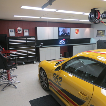 Organized garage with tool chests, cabinets, and Porsche - Richard from Trenton, TX