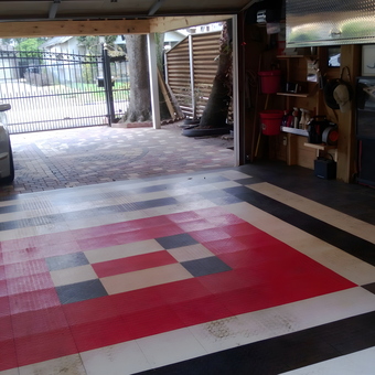 Garage with Modular Flooring, Cabinets, and Car Care Storage - Mario from Houston, TX