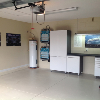 Modern garage with white cabinets and storage - Marty from Winter Haven, FL