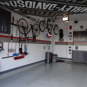 Organized garage with cabinets, bike racks, and wall hooks - Dan from Brighton, CO